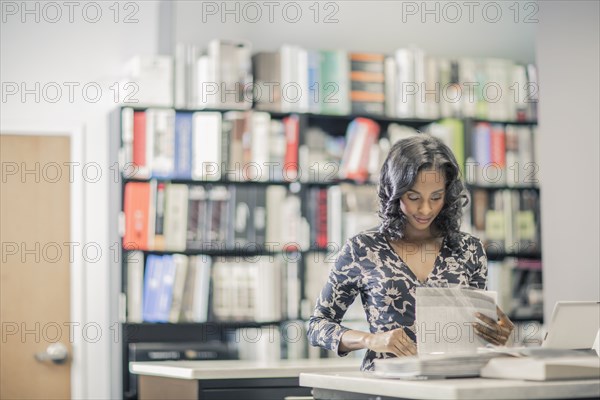 African American businesswoman working in office