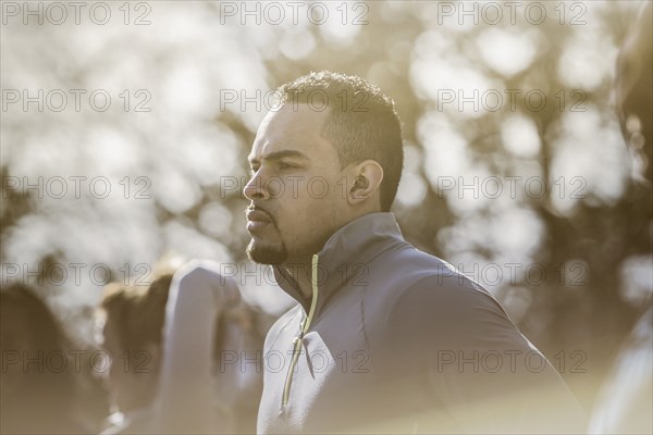 Close up of serious athlete outdoors