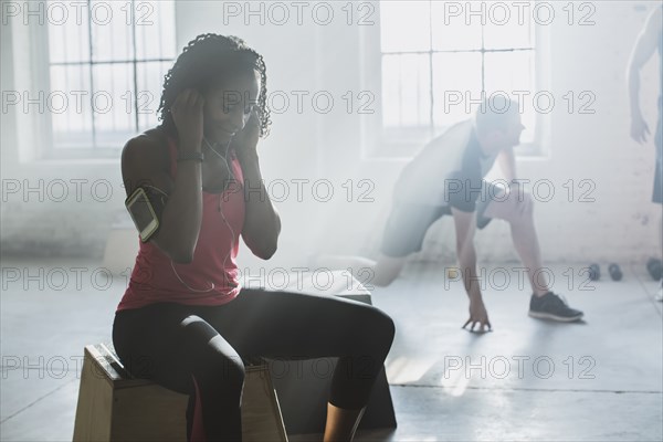 Athletes resting in gym