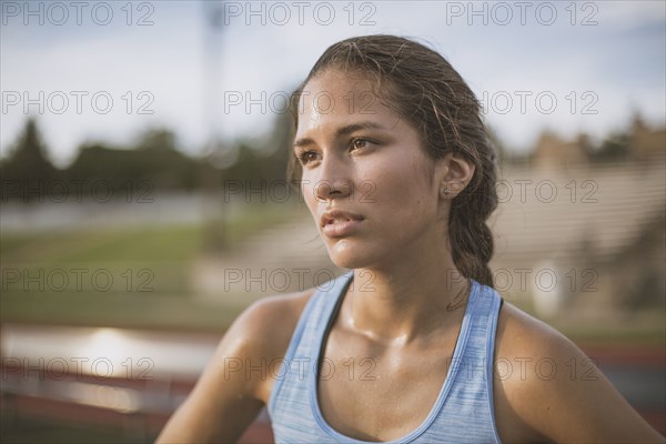 Mixed race athlete on sports field