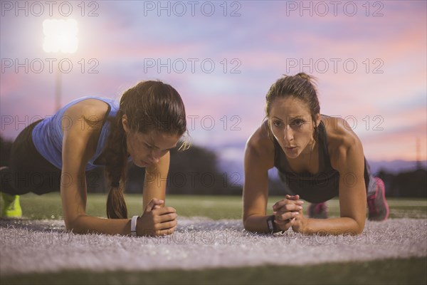 Athletes working out on sports field