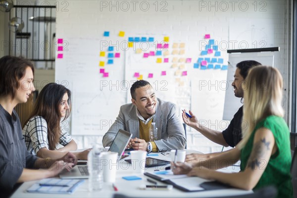 Business people talking in office meeting