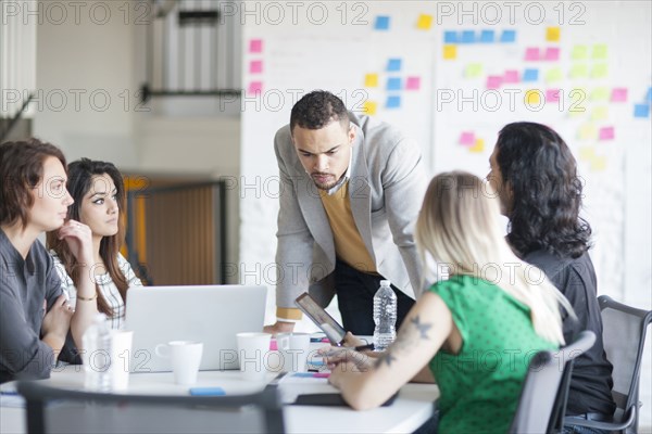 Business people talking in office meeting