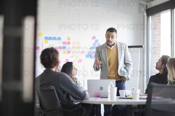 Business people talking in office meeting