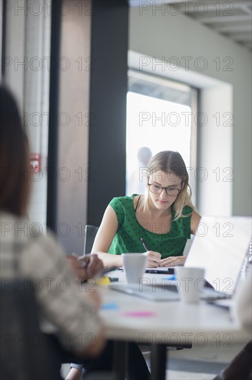 Business people working in office meeting