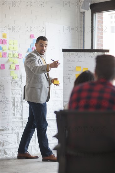 Businessman talking in office meeting