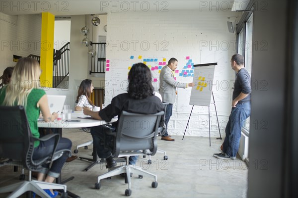 Business people talking in office meeting