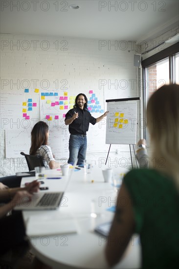 Business people talking in office meeting