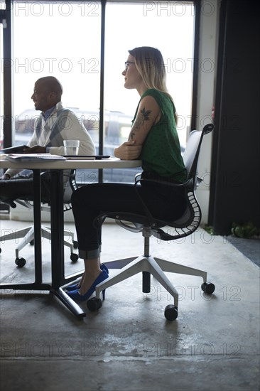 Business people listening in office meeting