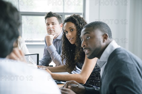 Business people listening in meeting