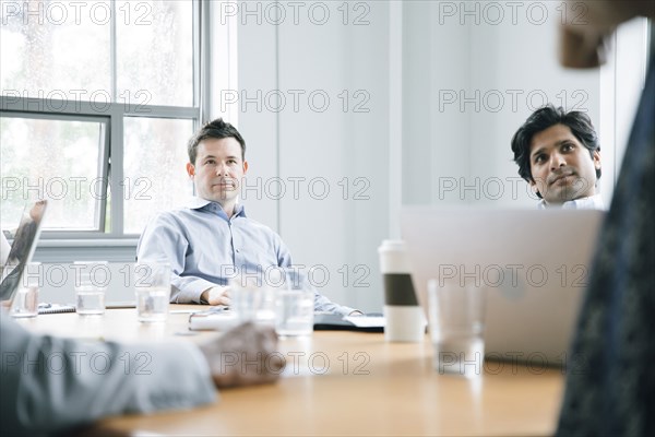 Business people listening in meeting