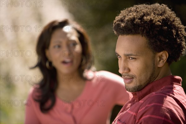 African American man ignoring girlfriend