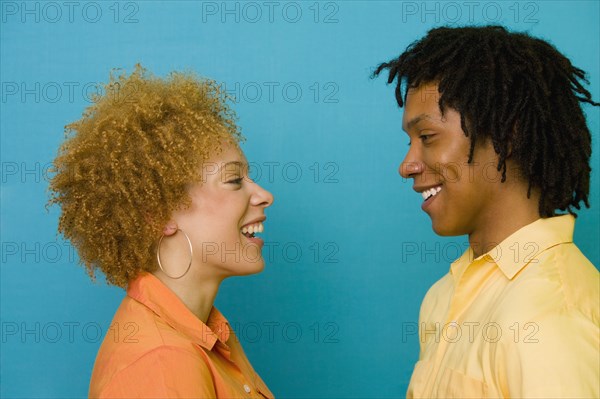 African couple smiling at each other