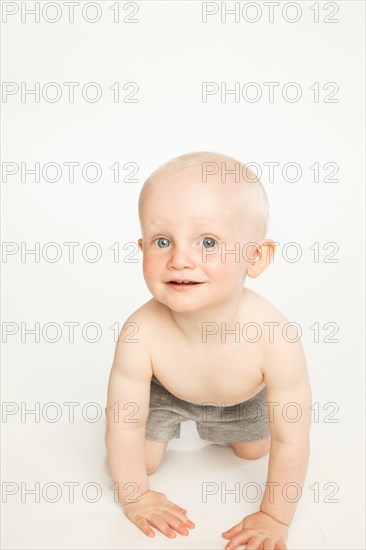 Caucasian baby crawling