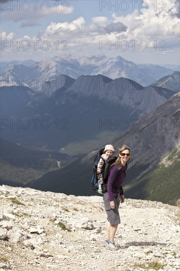Caucasian mother and baby hiking