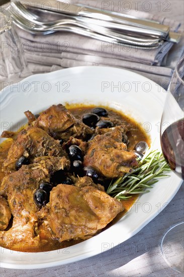 Italian coniglio e olive or rabbit and olives