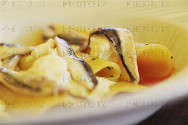 Close up of fish and pasta dish