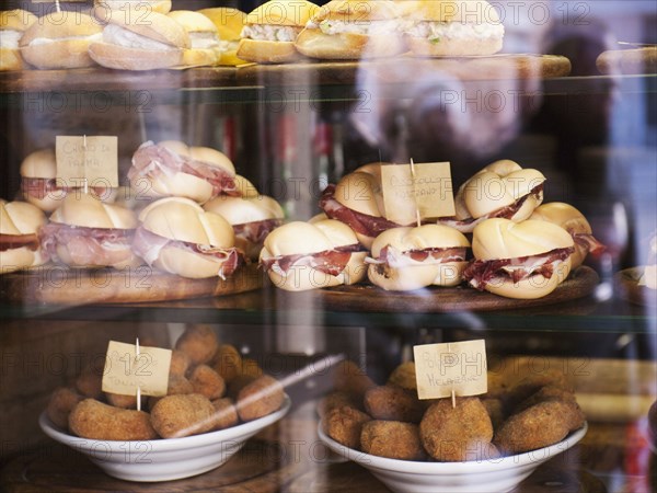 Sandwiches and croquettes for sale in window