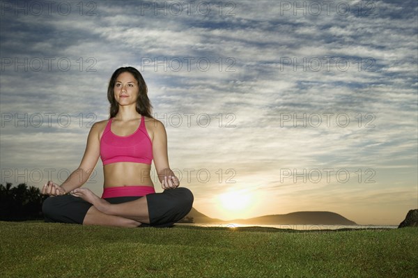 Pacific Islander woman meditating