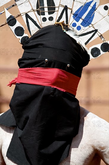 Apache man wearing traditional regalia