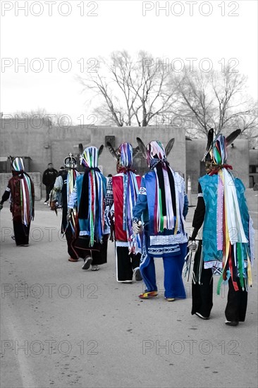 Indigenous dancers wearing traditional clothing