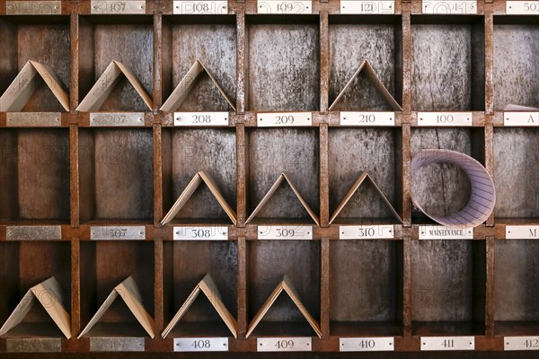 Messages in wooden slots in hotel