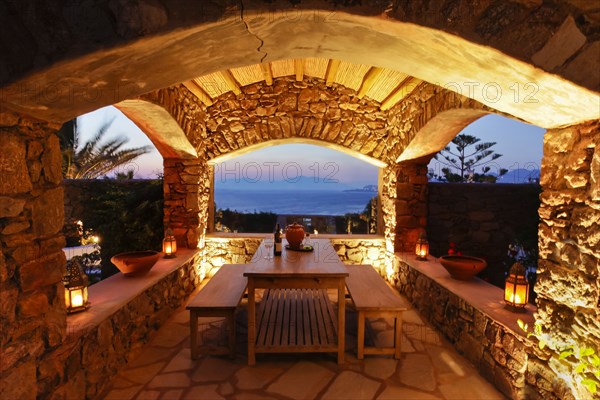 Illuminated stone patio at night