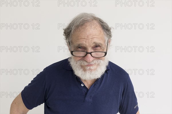 Portrait smiling older Caucasian man with beard