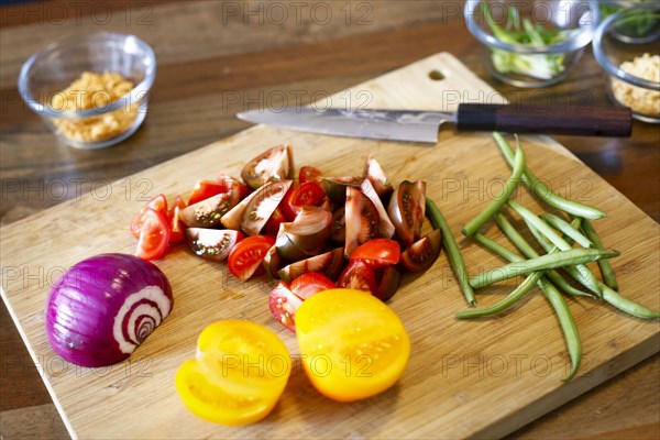 Chopped vegetables on cutting board