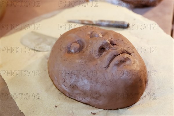 Clay mask in art studio