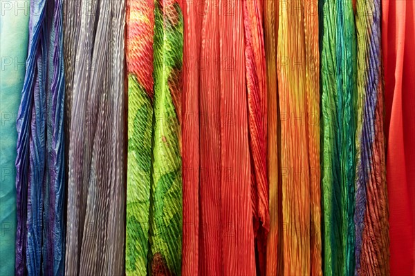 Row of multicolor scarves