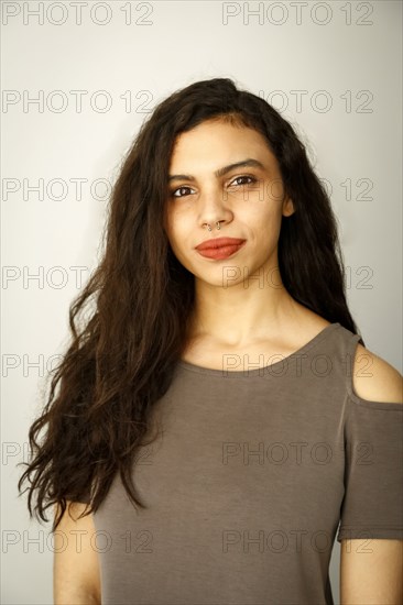 Portrait of mixed race woman with nose ring