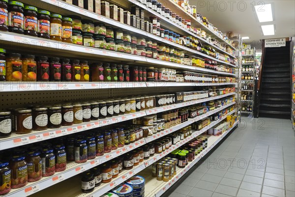 jars of food in supermarket aisle