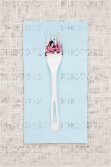 Fork on napkin with icing