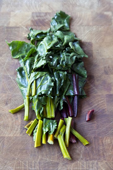 Various lettuces on cutting board