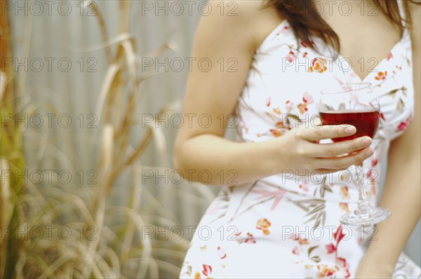 Woman holding a glass of wine