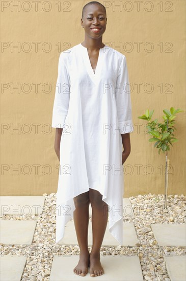 African American woman standing on flagstone