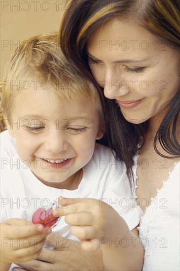 Close up of mother and young son