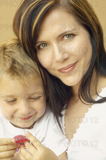 Close up of mother and young son