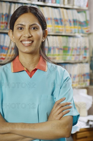 Indian female dental assistant in office