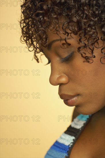 Close up of African woman with eyes closed