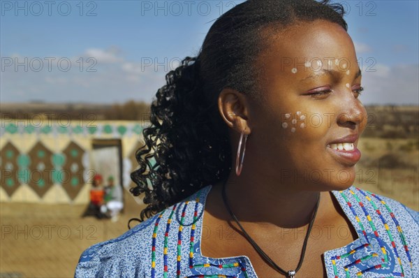 African woman with paint on face