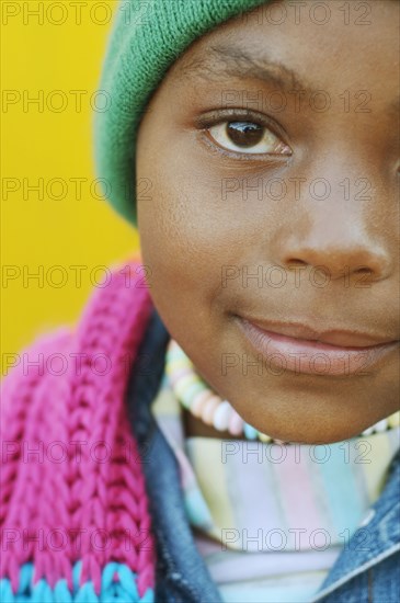 Close up of African girl wearing winter hat