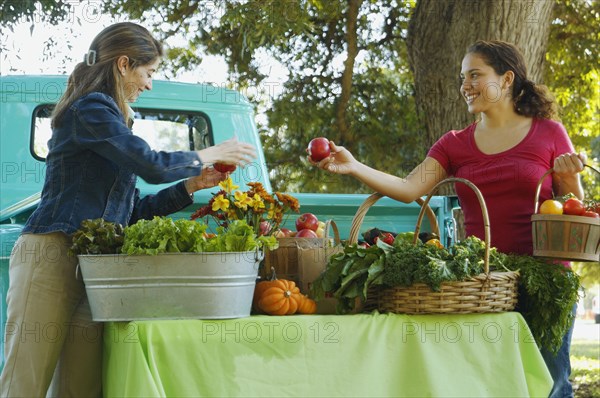 Hispanic women at organic farm stand