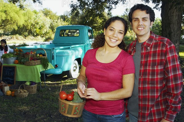 Multi-ethnic couple hugging