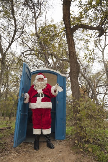 Santa leaving portable toilet