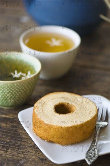 Close up of jasmine tea and wheat cake