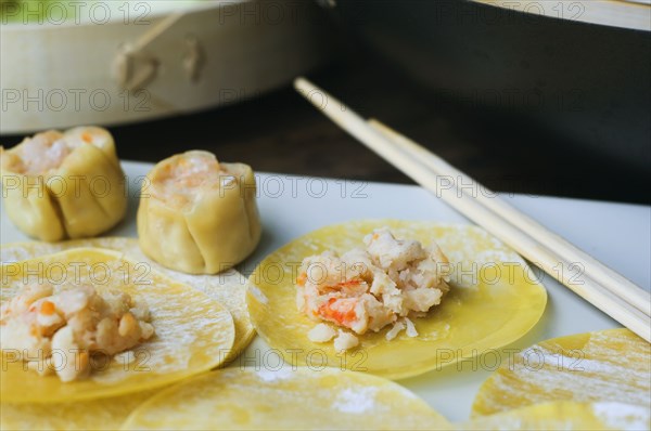 Asian dumplings in process of being made