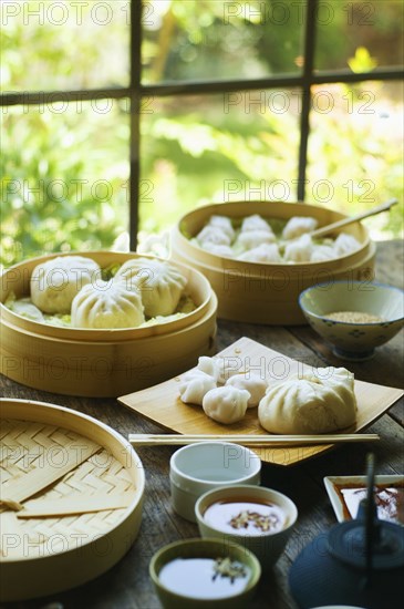 Asian dumpling in steamer with cabbage