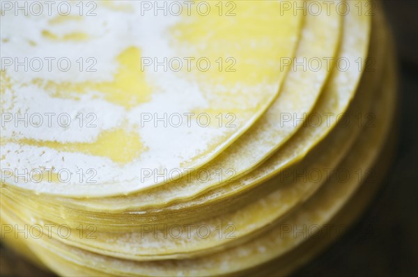 Close up of dumpling wrappers in a stack